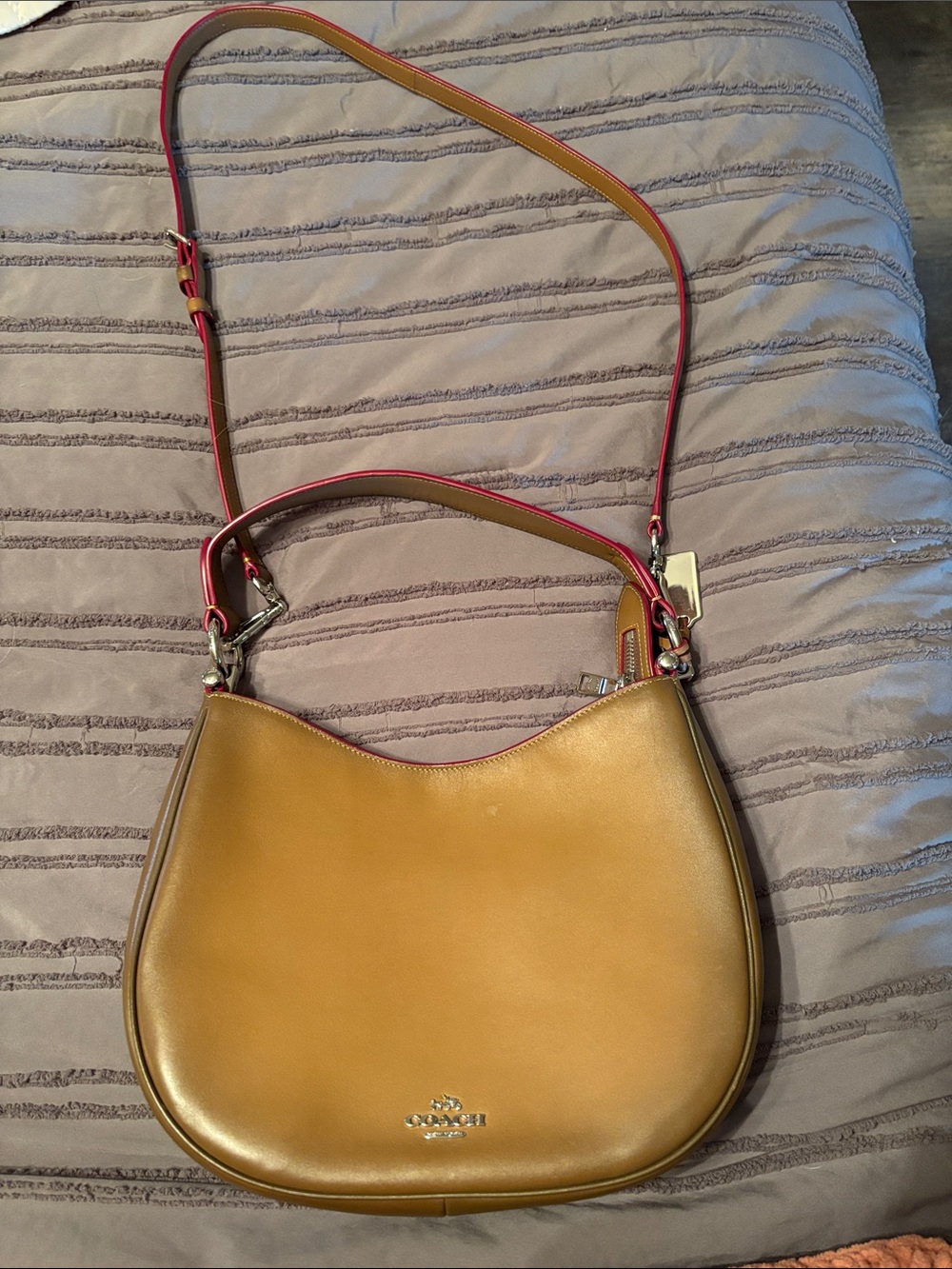 Coach Saddle Shoulder Bag in Tan with Red Trim-leather interior.